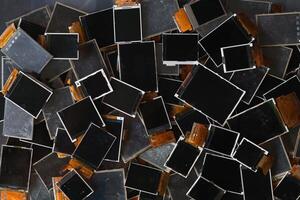 damaged LCD screens of mobile phones are collected as electronic waste waiting for valuable metals inside LCD screens be sorted for reuse reducing e-waste in nature and increasing value of e-waste. photo