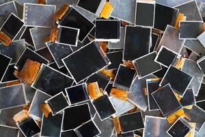 damaged LCD screens of mobile phones are collected as electronic waste waiting for valuable metals inside LCD screens be sorted for reuse reducing e-waste in nature and increasing value of e-waste. photo