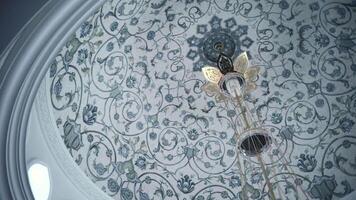 White dome in temple with pattern. Scene. Beautiful domed vault in white temple. Floral pattern on white dome in Muslim temple video