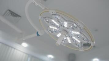 Surgery theatre details and equipment. Action. Bottom view of the lamp in the operation room. video