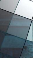 A close-up of a colorful reflective disco mirror ball slowly on a blurry colored background. Mirror ball, animation video