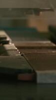 Close-up of automated drilling machine on wood. Creative. Automated machine for production of wood products processing. Drilling machine for holes in wooden boards video