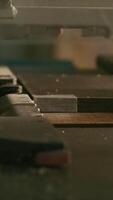 Close-up of automated machine for wooden boards. Creative. Modern automated machine for wooden boards. Industrial machine moves according to given installation video