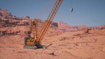 A large crane in the middle of a desert video