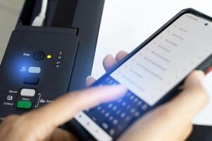 The concept of printing documents via Wi-Fi, connecting wireless devices, wireless printing photo