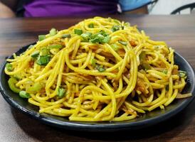 Schezwan Noodles or vegetable Hakka Noodles or chow mein photo
