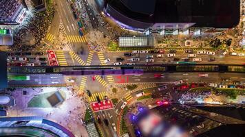 Aerial timelapse of evening traffic at Bukit Bintang intersection, Kuala Lumpur video