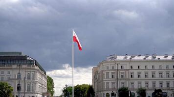 Poland flag waving in the wind in the blue sky. Polish white-red flag in the clouds. video