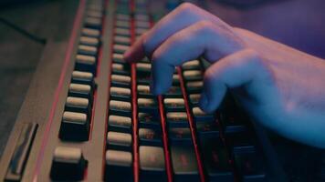 Close up cropped view guy male gamer man streamer influencer blogger hacker businessman business worker student typing computer keyboard work study education e-sport gaming game cyber addict video