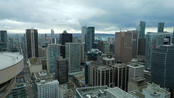 Aerial view of skyscrapers in Downtown of Vancouver during the snowfall, Canada video