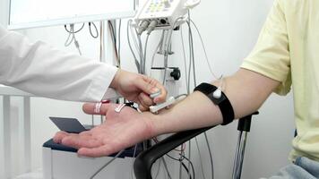 Electromyography for testing patient nerve activity. A modern medical test to detect nerve and muscle issues. Perfect for showcasing professional diagnostics. video