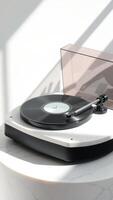 Turntable on Marble Surface with Minimalist Aesthetic photo
