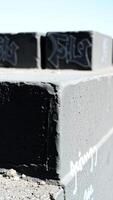 Black and White Concrete Block with Graffiti photo