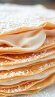 Close-up of a Delicious Pastry with Creamy Filling and Powdered Sugar photo