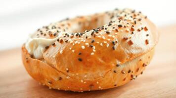 Close-up of a Freshly Baked Everything Bagel with Cream Cheese photo
