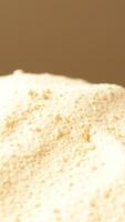 Close-up of White Sesame Seeds on a Soft, Creamy Surface photo