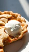 Closeup of Peach Pie with Ice Cream photo