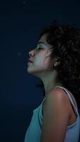 Woman in Profile with a Softly Lit Face photo