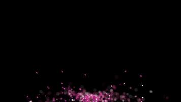 Elegant dust particles with a glowing flare on a black background, shown in slow motion. video