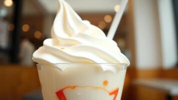 Close-up of a Vanilla Soft Serve Ice Cream in a Cup photo