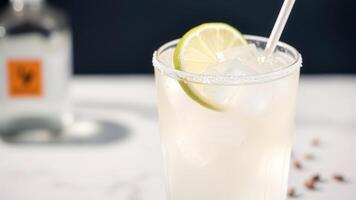 Close-up of a refreshing cocktail with lime and ice photo