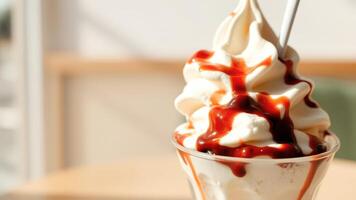 Close-up of Soft Serve Ice Cream with Caramel Drizzle photo