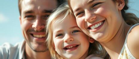Close-up of a happy family smiling together photo