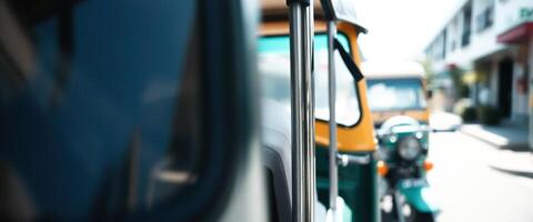 Metal Bar on a Tuk Tuk in a City photo