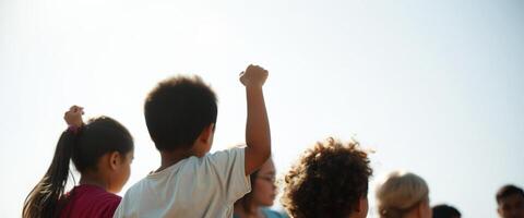 Children looking up at the sky photo