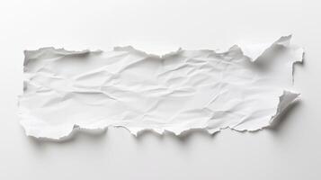 Rectangular Piece of Torn and Crumpled White Paper in Minimal Studio Setting photo