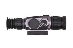 modern black optical scope for weapon isolated on whited. sight scope isolated on white back. photo