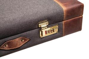 luxury brown leather case with gold-plated combination locks for arms isolated on white photo
