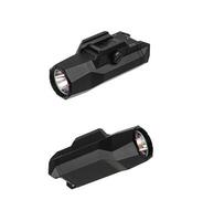 Modern LED flashlight with weapon mount. Underbarrel tactical flashlight isolate on white back. photo