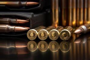 Bullet isolated on black background with reflexion. Rifle bullets close-up on black back. Cartridges for rifle and carbine on a black. photo