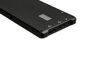 A small portable LED panel on the battery. Lighting device for photo and filming. Isolate on a white back.