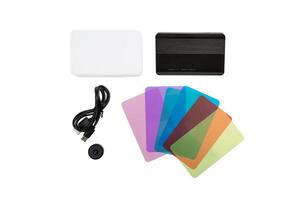 A small portable modern LED lamp with the ability to change the color of light using filters. Isolate on a white back. photo