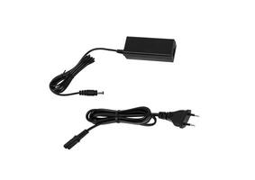 Power supply for various electronics. A device for converting AC 220 volts to DC. Isolate on a white back. photo