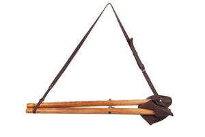 Folding wooden hunting stool tripod isolate on white background. Three-legged camping chair, Made of wood and leather. photo