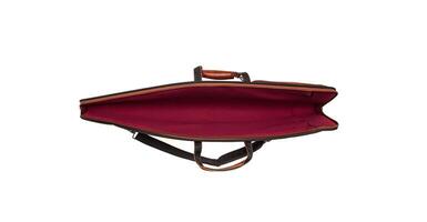 Luxury leather case for weapons isolate on a white back. Brown leather case for a hunting rifle. Soft yet secure storage case for transporting weapons. photo