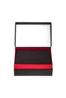 A small open black paper box with a red stripe for a gift. Gift wrapping isolate on white background. photo