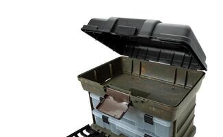 Portable plastic container with opening lid and additional sliding compartments. Fishing or hunting box. Isolate on a white back. photo