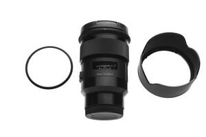 Modern lens with a focal length of 50 mm and aperture f 1.4 isolate on a white back. photo