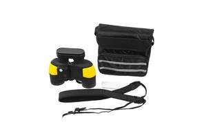 Modern black and yellow waterproof and unsinkable marine binoculars.. Surveillance device. Device for viewing at a distance. Isolate on a white back photo