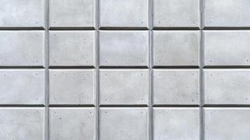 Closeup of a plain concrete wall in soft natural light smooth texture with faint gradients in light gray suitable for clean and modern aesthetic designs photo