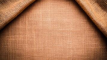 Rough burlap texture with subtle orange and brown tones perfect for Thanksgiving backgrounds autumn vibes emphasized by rustic weave pattern photo
