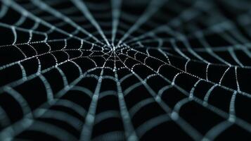 Deep black background with subtle creepy spiderweb texture thin strands catching dim light Halloween spooky atmosphere minimalist eerie yet stylish design for seasonal projects photo