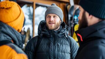 Busy snowboard rental station with people trying on boots selecting boards lively conversations inside a warm, cabin like setting snow visible just outside photo