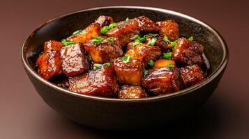 Chinese braised pork belly with chestnuts in a rich soy based sauce, hearty and glossy, served against a gradient background from dark brown to warm amber photo