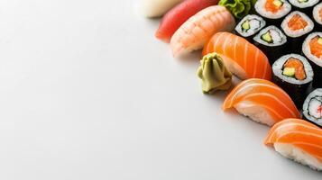 Elegant sushi platter with assorted nigiri and sashimi, arranged in the corner of the frame, leaving a spacious clean white background for text photo