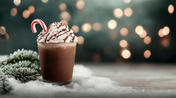 Frosty peppermint mocha with candy cane garnish, whipped cream, and chocolate drizzle, placed on a snowy table with frosted evergreen branches and soft winter bokeh in the background photo